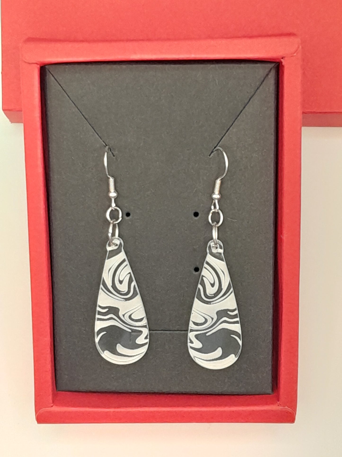 Acrylic tear drop swirl earrings