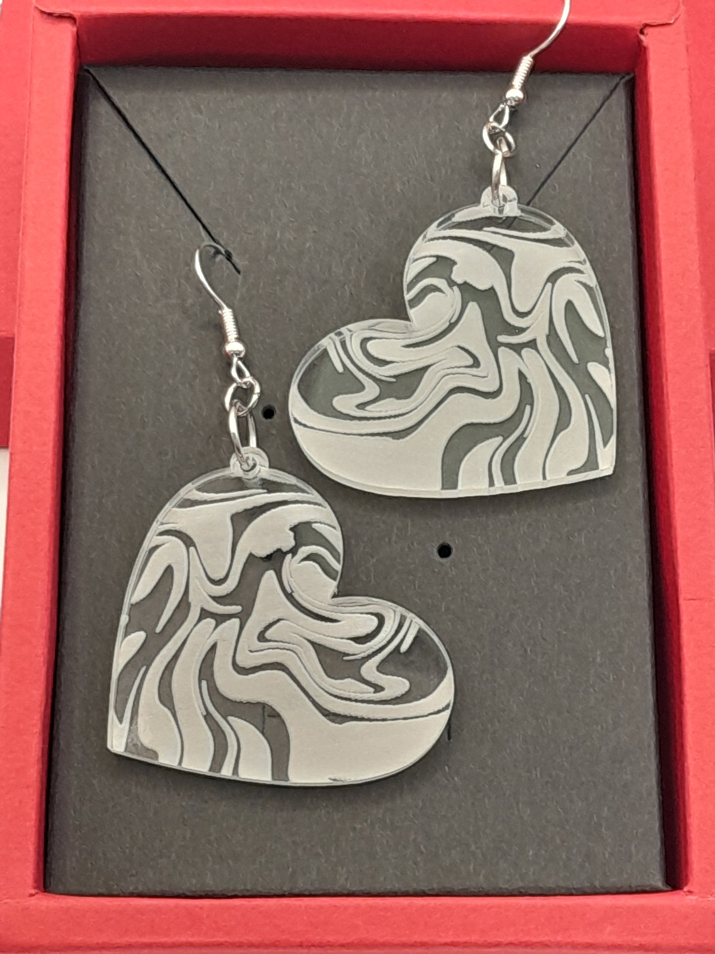 Acrylic heart swirl earrings