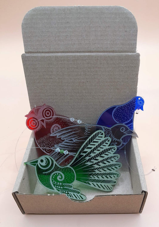 Set of four mixed colour laser cut and engraved native NZ bird decorations