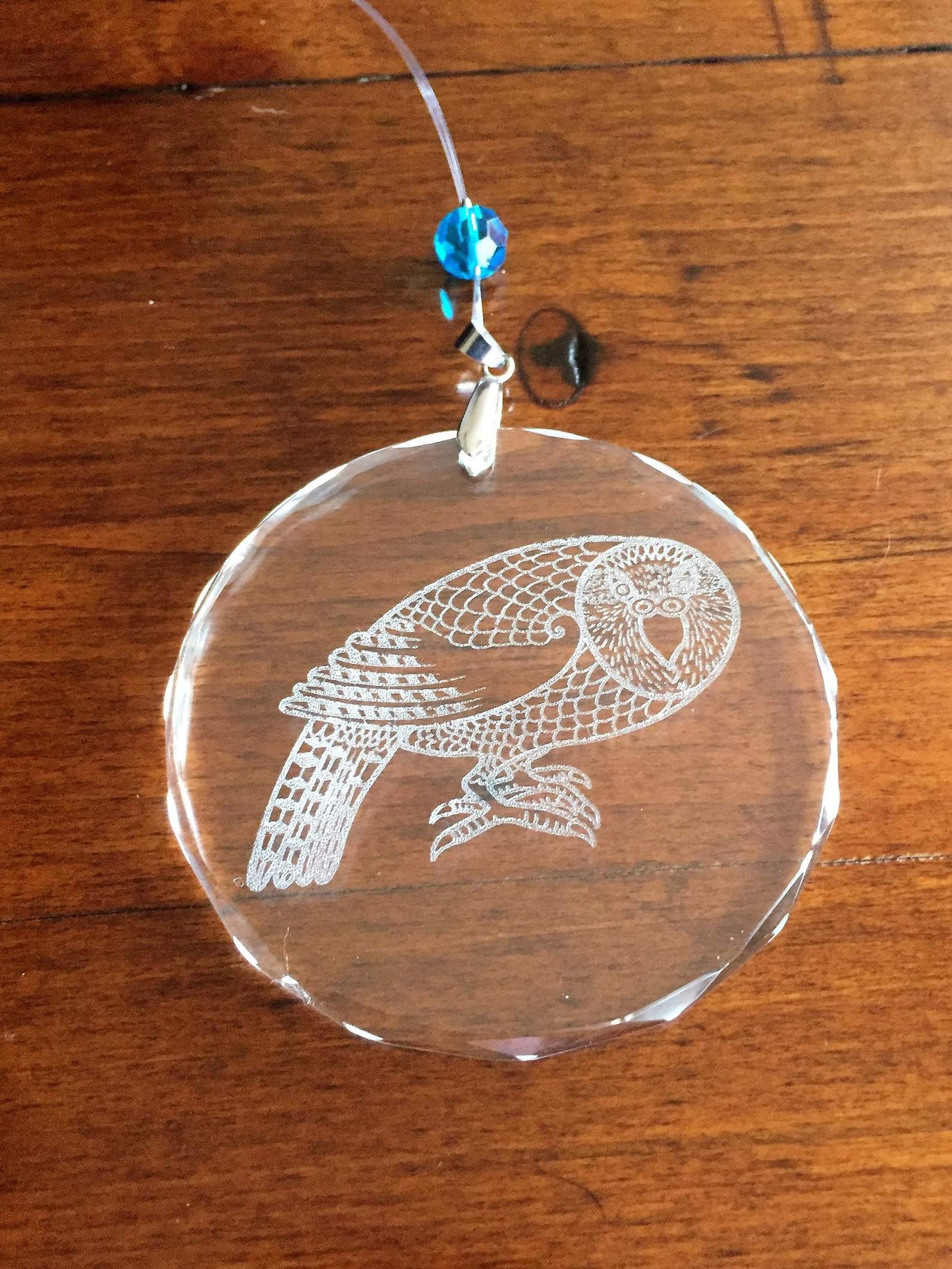 Kakapo engraved crystal